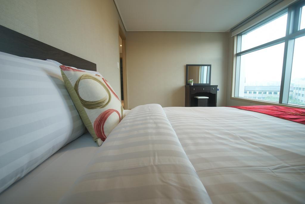 R&T Hotel Чеджу Стая снимка